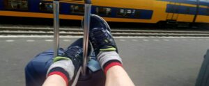 Marty-feet-up-waiting-for-train-to-Amsterdam